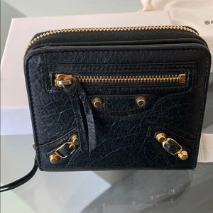 Balenciaga bi-fold zip around leather wallet